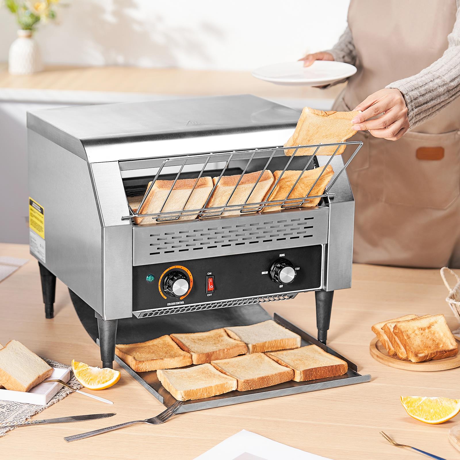 Kitchen Appliances In - 業務用コンベア式トースター。1時間あたり450枚のパンを焼くことができ、頑丈なステンレス製で、電気式。レストランや厨房で使用できるパン、ベーグル、食パンなどを焼くための機械。